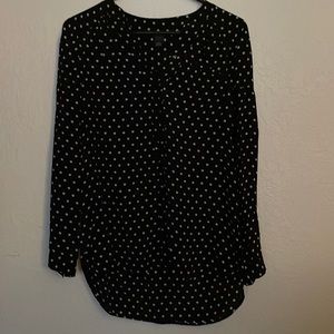 Black shirt with white dots.